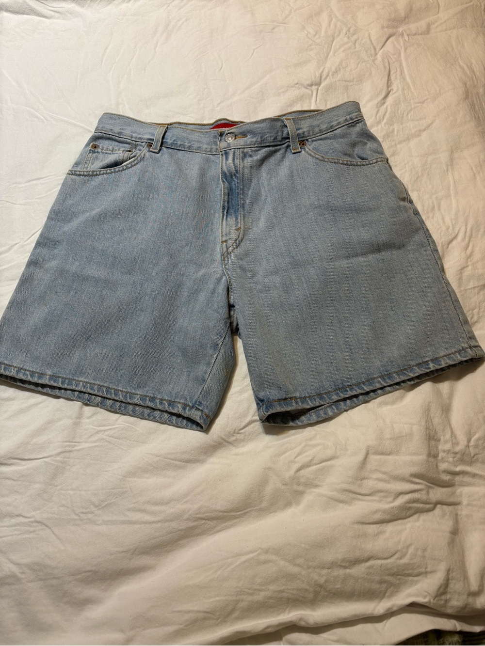 Vintage Levi classic fit denim shorts size 14 traditional five pockets. Zip fly
